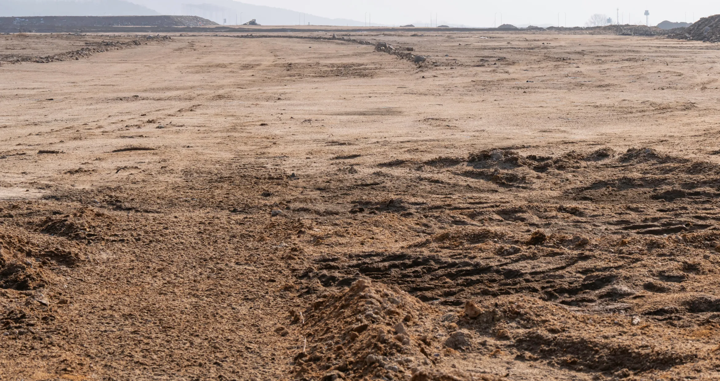 Construction site preparation project in Dallas with land leveling and build-ready grading